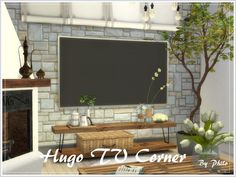 a living room with a large blackboard in the corner and flowers on the coffee table