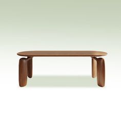 an oval wooden table with two legs on the top and one leg extended to the side