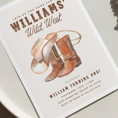 a close up of a plate with a card on it that says williams wild west