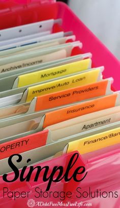 file folders with labels on them and the words, property simple paper storage solution