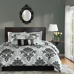 the madison park bedding is in black and white