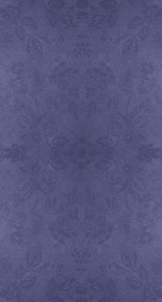 an image of a purple wallpaper with floral designs on it's edges and sides