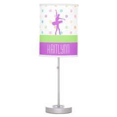 a lamp with a ballerina on it and the name kathyn written in purple