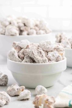 two bowls filled with white chocolate puppy chow