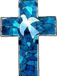 a cross made out of blue glass with a white dove on the center and bottom