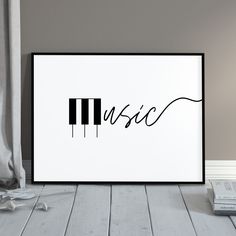 a black and white poster with the word music written in cursive writing on it