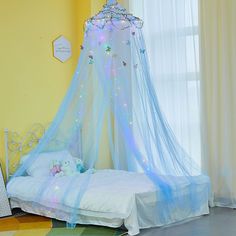 PRICES MAY VARY. Princess Bed Canopy -- Our girls canopy is dotted with glow-in-the-dark stars and LED lights(Battery not included), which illuminates the bedroom. It will looks more dreamy at night. Kids will love to go to bed on time and no longer afraid to turn off the lights when they go to sleep. Get a good night’s sleep. Package Included -- 1pcs bed canopy, 1pcs sticky hook, 1 set screw and hook, butterflies and stars stickers, 10meters LED light(Battery not included), 20meters rattan. DIY Diy Princess Room Decor, Diy Princess Room, Mint Bedroom, Princess Canopy Bed, Princess Canopy, Princess Room Decor, Canopy Bed Curtains, Canopy Curtains, Toddler Crib