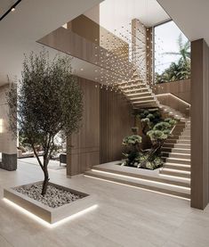 a tree in a planter next to a staircase with lights on the walls and floor