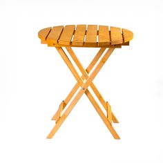 a wooden folding stool with one foot resting on the seat and another sitting on top