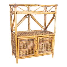 a wicker shelf with two baskets on top and one drawer below the shelf is made out of bamboo