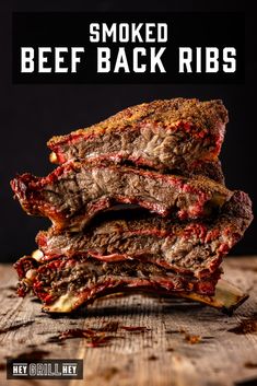 beef back ribs stacked on top of each other with the words smoked beef back ribs