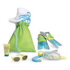 an assortment of beach toys including sunglasses, flip flops and sunscreen