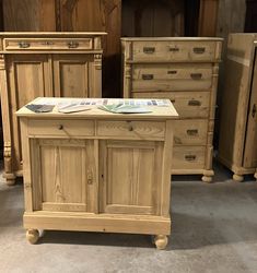 several pieces of furniture are on display in a store