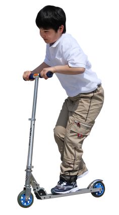 a young boy riding on the back of a scooter with wheels and no helmet