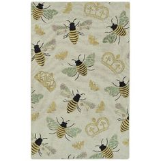 a rug with bees and hearts on it