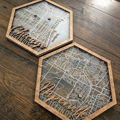 two wooden coasters sitting on top of a table