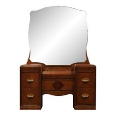 an antique dressing table with mirror and drawers on the top, isolated against a white background