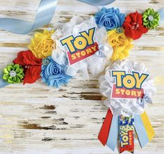 two toy story ribbons with flowers on them