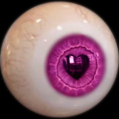 an eyeball with a heart shaped hole in it's center is seen here