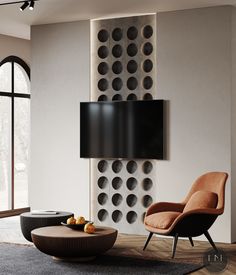 a modern living room with an abstract wall decoration