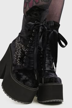 IN A PHASE.- Statement velvet platform boots.- Fern inspired embroidery.- Wine purple ribbon laces.- Includes black ribbon lace option.- Side zip.- Heel height 14cm / 5.5".- Platform height 6cm / 2.4".With KILLSTAR branding, Upper: 100% Polyester, Sole: 100% Rubber.Wipe Clean Only (with a damp cloth). Imported. Emo Platform Shoes, Alt Wedding Shoes, Goth Platform Heels, Gothic Shoes Heels, Black And Purple Wedding Decorations, Goth Cowboy Boots, Draculaura Boots, Goth Wedding Shoes, Whimsigoth Boots