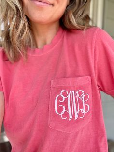 Welcome to LuLu Bleu Boutique!! Thank you for visiting my shop! This monogram short sleeve pocket tee is so comfy and cute! Comfort Colors is a top of the line brand! This shirt is excellent quality and SO comfortable! These shirts are crew neck and come in a variety of colors. I can do any color monogram on the shirt in any type of font you would like! If you have a creative idea that you do not see on my page message me and I will try my best to accommodate your request:) **I can also order th Monogram Pocket Tees, Monogram Shirt, Embroidered Items, Pocket Tee Shirts, Monogram Shirts, Creative Idea, Pinterest Closet, Embroidery Ideas, Shirt For Women