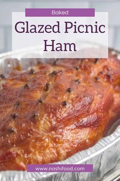 baked glazed picnic ham in an aluminum pan with text overlay that reads baked glazed picnic ham