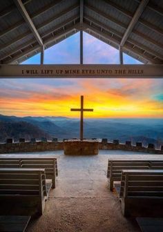 the facebook page is shown with an image of a cross and mountains in the background