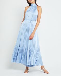 Product Details Look effortlessly elegant in this luminous blue dress. Done with adjustable ties and a beautifully pleated skirt.- Back necktie- Waist tie- Content: 100% Polyester Style# T22WDR12012N Fit Notes - Model wearing a size S- Model measurements: Height: 5'10.5" Bust: 32" Waist: 25.5" Hips: 34.5" Size Length Bust XS 132 108 S 134 112 M 136 116 L 138 120 XL 140 124 Blue Pleated Dress, Baby Blue Dress, Baby Blue Dresses, Textile Waste, Bra Size Charts, Brand Collection, Jacket Brands, Active Wear Tops, Pleated Dress