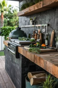 an outdoor kitchen with lots of cooking utensils