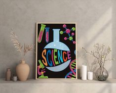 a poster with the word science on it next to some vases and flowers in front of a wall