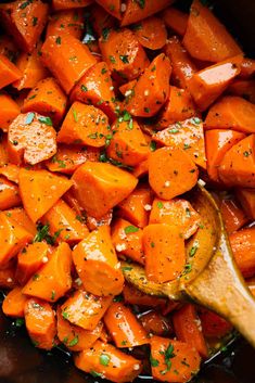 cooked carrots and parsley in a slow cooker