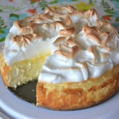 a lemon meringue pie is on a plate