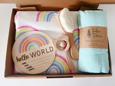 Our Baby Gift Boxes come with the cutest gifts for every newborn. Each box includes: - Premium Ultra soft sherpa blanket - Wooden Birth Annoucement Disc - Wooden Baby Rattle - Wooden Baby Brush - Super soft Muslin Swaddle - Gift Box Rattle is display item only and not to be used as a toy. Keep out of the hands of children. Wooden Baby Rattle, Newborn Gift Boxes, Birth Announcement Gifts, Personalized Corporate Gifts, Rainbow Baby Gift, Gin Gifts, Newborn Blankets, Baby Gift Box, Muslin Swaddle