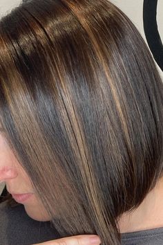 Woman with chocolate brown hair enriched with subtle caramel highlights. Chocolate Brown Hair With Caramel, Brown Hair With Caramel, Brown Hair With Caramel Highlights