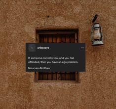 a bird perched on top of a window sill next to a wall with a sign that says, if someone corrects you and you feel offloaded, then you have an app problem