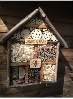 a bird house made out of wood and other items