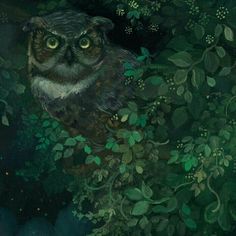 an owl sitting on top of a tree next to green leaves and flowers with the caption's name in german