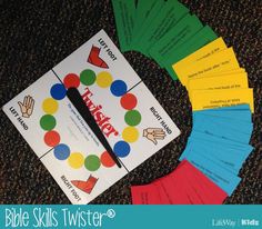 the bible skills twister game is ready to be played on the floor with it's matching cards