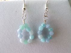 Subtle shades of blue in these fun summer earrings. Summer Light Blue Pierced Earrings, Trendy Light Blue Drop Earrings, Blue Dangle Hoop Earrings, Trendy Light Blue Dangle Earrings, Light Blue Drop Earrings For Summer, Trendy Blue Dangle Teardrop Earrings, Hypoallergenic Blue Earrings For Summer, Blue Drop Earrings For Summer, Blue Dangle Hoop Earrings As Gift