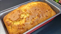 a loaf of bread sitting in a metal pan