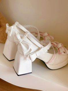 Step into a world of elegance and charm with our Bow at Top White and Pink Sweet High Block Heel Mary Janes. These shoes are the perfect blend of classic design and modern style. A delicate bow adorns the top, adding a touch of sweetness and femininity. The sturdy high block heel provides both height and stability, making these shoes perfect for all-day wear. The Buckle Ankle Strap provides secure wear.  The price is for a pair of shoes only, others are not included.  Garment Size   	 		 			Size Heel Mary Janes, Mary Jane Heels, Pink Bow, Mary Janes, Block Heels, Ankle Strap, Classic Design, Modern Style, Buckle