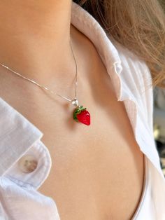 Introducing Our New Wild Strawberry Necklace Charm🍓 Each glass Wild Strawberry takes up to 25 minutes to be handcrafted in an open flame, reaching temperatures of up to 1000 degrees Celsius. After crafting, the beads are placed in a kiln for eight hours to ensure durability and longevity. Following this heating process, the beads are carefully washed by hand to remove them from the mandrel. They are then meticulously cleaned, reamed, and polished to perfection, meaning that each jewelry piece r Resin Beaded Jewelry For Gifts, Resin Jewelry With Round Beads As Gift, Handmade Murano Glass Jewelry For Gifts, Handmade Murano Glass Jewelry Gift, Berry Necklace, Whimsical Pink Charm Necklace With Lobster Clasp, Strawberry Pearl Necklace, Adjustable Czech Glass Beaded Necklaces With Lobster Clasp, Glass Pendant Necklace With Lobster Clasp