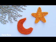 two crocheted stars and a crescent