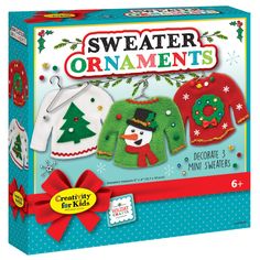 the sweater ornament kit is shown in its box and includes an image of a snowman