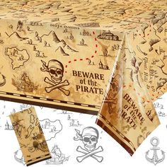 a pirate themed table cloth with skull and crossbones