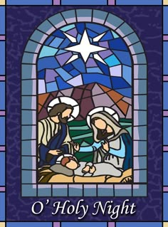 a stained glass window depicting the birth of jesus