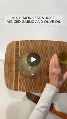 a person is cutting up some food on a cutting board