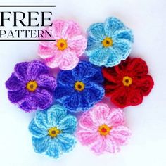 crocheted flowers are arranged on a white surface with the words free pattern above them