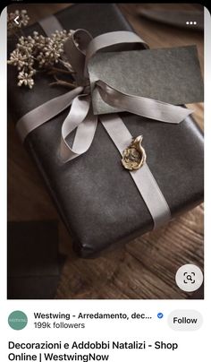 an image of a present wrapped in grey paper